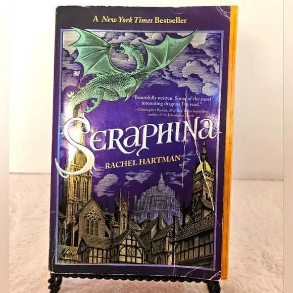 Seraphina Rachel Hartman  Can one girl unite two worlds? Kids Toy Book - Picture 5 of 12